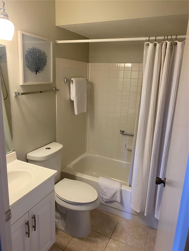 full bathroom with tile patterned flooring, vanity, toilet, and shower / tub combo with curtain