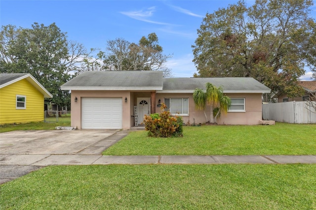 single story home with a garage and a front yard