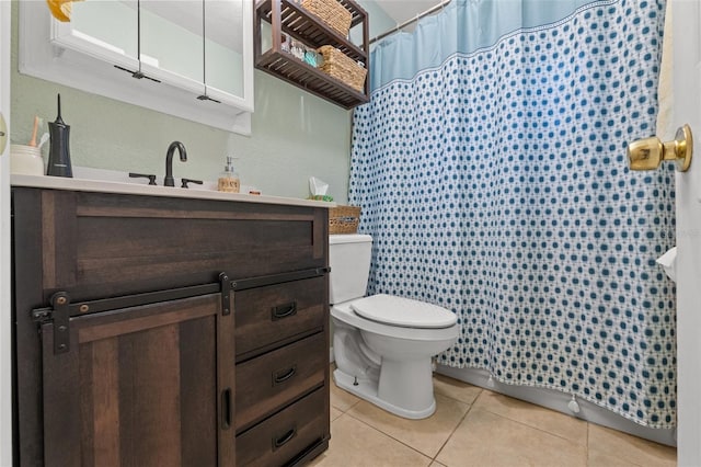 bathroom featuring vanity, toilet, curtained shower, and tile patterned flooring