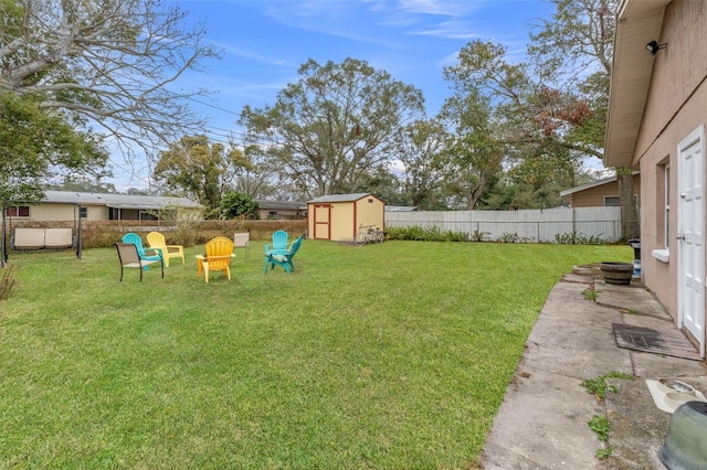 view of yard featuring a storage unit