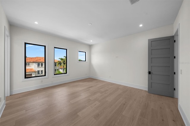 5038 W Dickens Ave, Tampa, FL 33629 - spare room featuring light wood-style flooring, baseboards, and recessed lighting