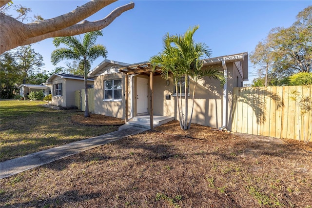 view of front of home with a front yard