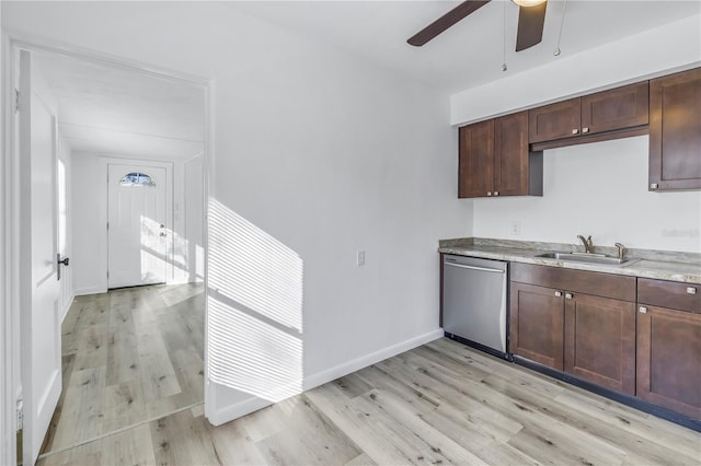 kitchen with stainless steel dishwasher, light wood-type flooring, ceiling fan, dark brown cabinets, and sink