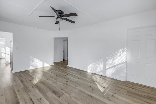 unfurnished room featuring ceiling fan and light hardwood / wood-style floors