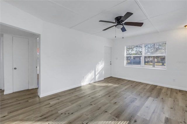 unfurnished room featuring ceiling fan and light hardwood / wood-style flooring