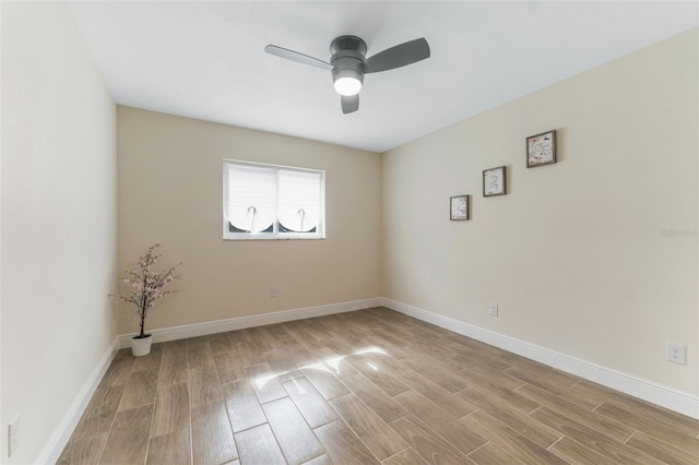 unfurnished room with ceiling fan and light hardwood / wood-style flooring