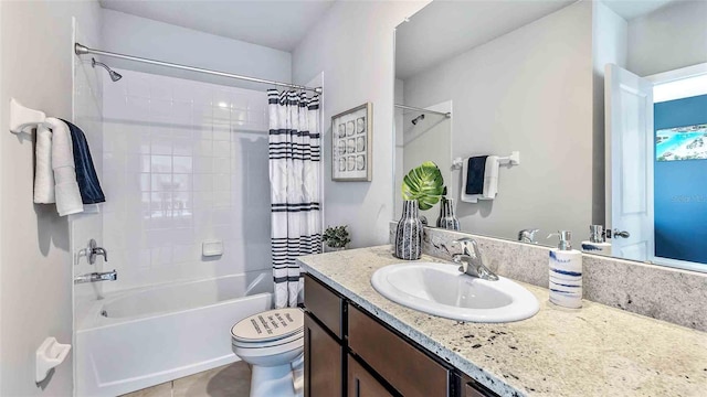 full bathroom with toilet, vanity, tile patterned floors, and shower / bath combo with shower curtain