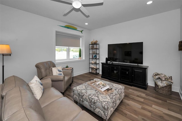 living room with ceiling fan and wood-type flooring