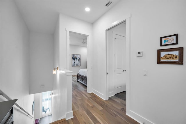 corridor featuring hardwood / wood-style flooring