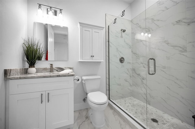 bathroom with walk in shower, vanity, and toilet