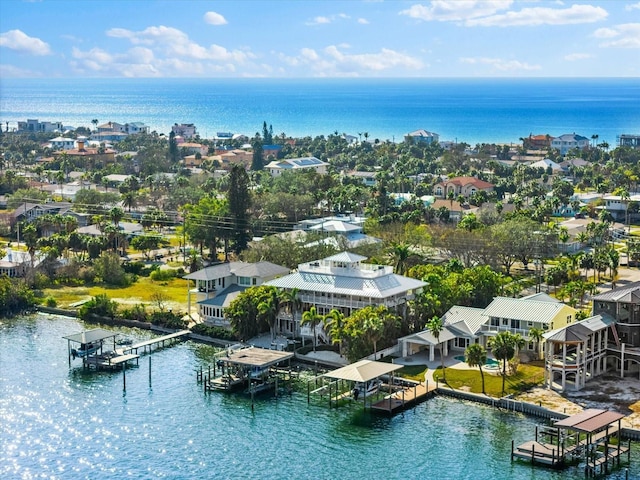 bird's eye view with a water view