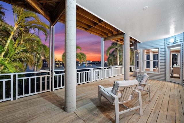 deck at dusk with a water view