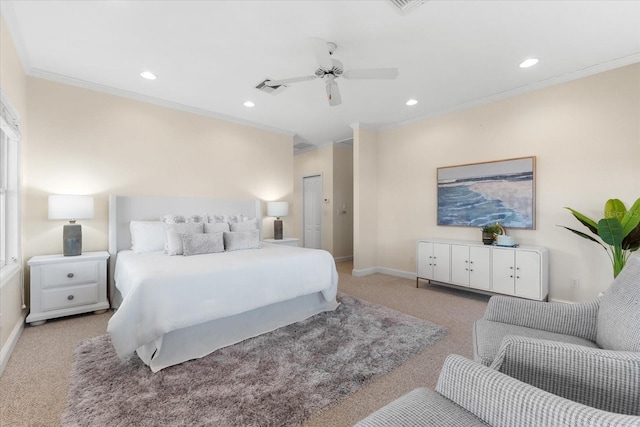 bedroom with ornamental molding, light colored carpet, and ceiling fan