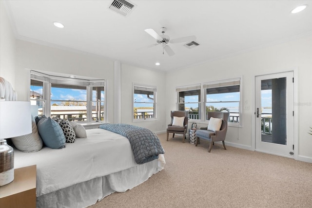 bedroom with multiple windows, crown molding, light carpet, and ceiling fan