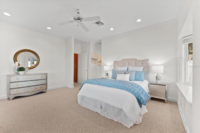 carpeted bedroom featuring ornamental molding and ceiling fan