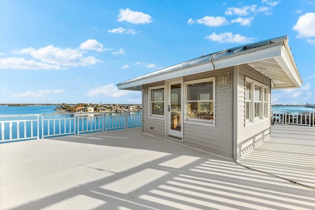 view of patio / terrace featuring a water view