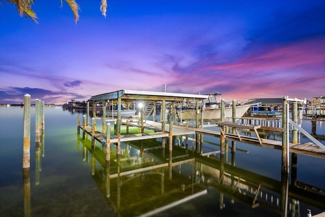 view of dock featuring a water view and boat lift