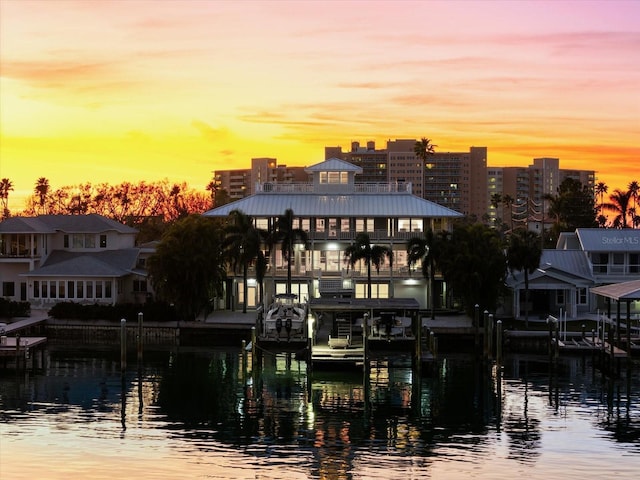 water view featuring a dock and boat lift