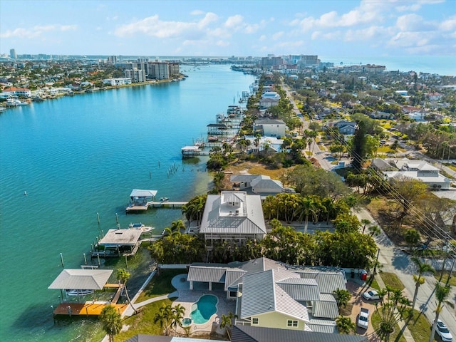 drone / aerial view with a water view and a city view