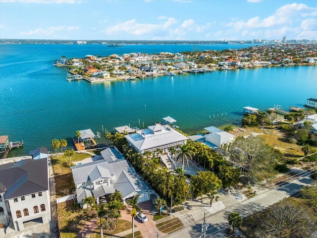 drone / aerial view with a water view