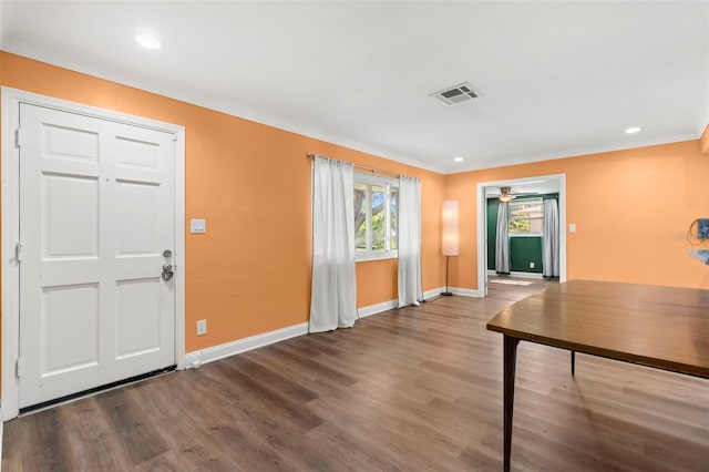 foyer entrance with hardwood / wood-style floors