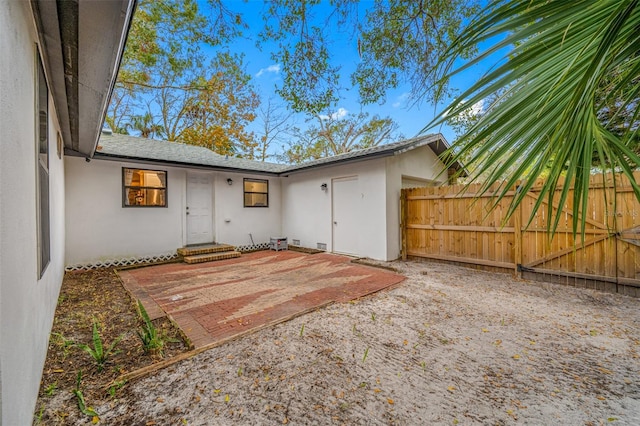 rear view of property featuring a patio