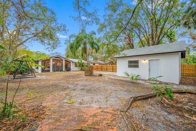 view of yard featuring a sunroom