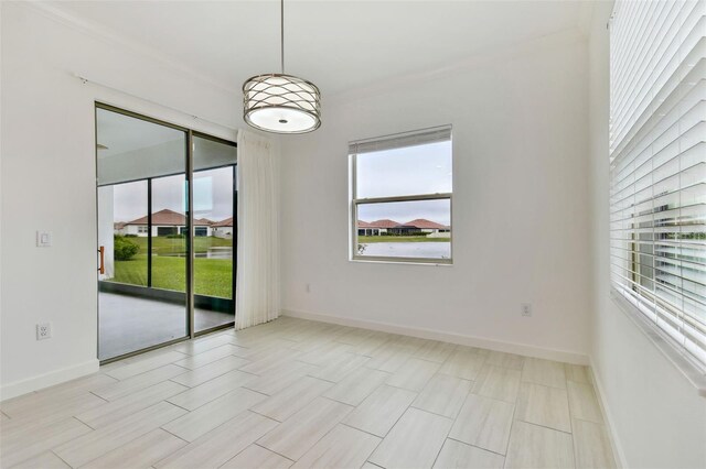 spare room featuring plenty of natural light