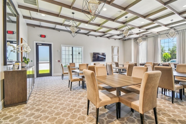 dining area with beamed ceiling and coffered ceiling