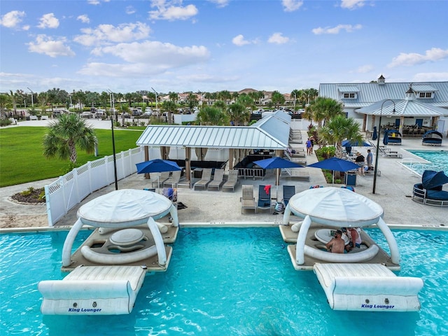 view of swimming pool featuring a gazebo and a patio area