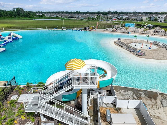 view of pool featuring a water slide