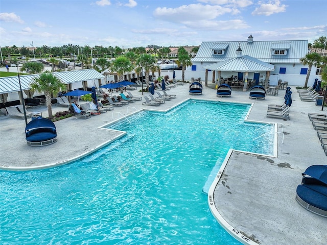 view of swimming pool featuring a gazebo and a patio area