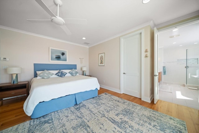 bedroom with hardwood / wood-style flooring, ceiling fan, and crown molding