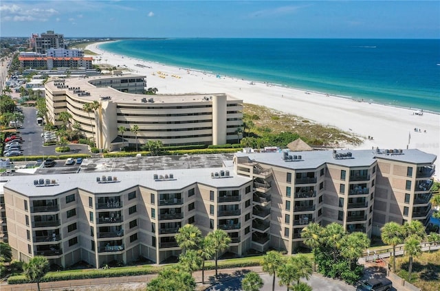 bird's eye view with a view of the beach and a water view