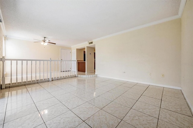 unfurnished room featuring a textured ceiling, ceiling fan, and ornamental molding