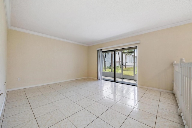 empty room featuring crown molding, light tile patterned floors, and a textured ceiling