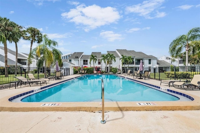 view of swimming pool featuring a patio area