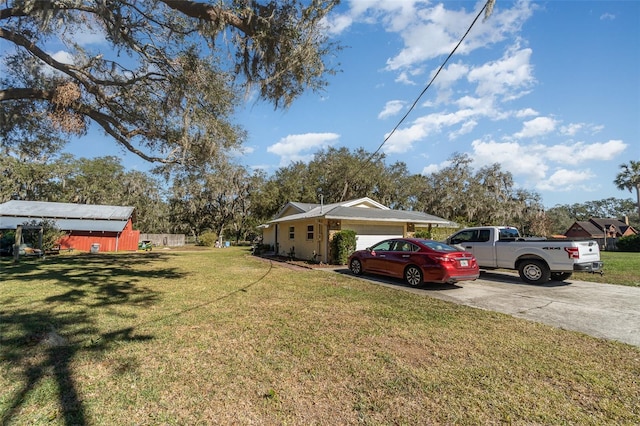 view of yard featuring a garage