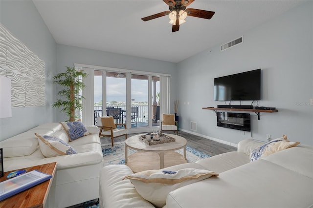530 S Gulfview Blvd Unit 205, Clearwater, FL 33767 - living room with a ceiling fan and wood finished floors