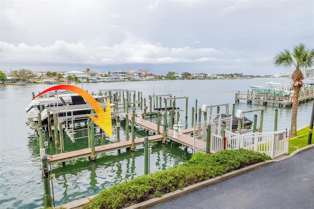 530 S Gulfview Blvd Unit 205, Clearwater, FL 33767 - dock area with a water view and boat lift