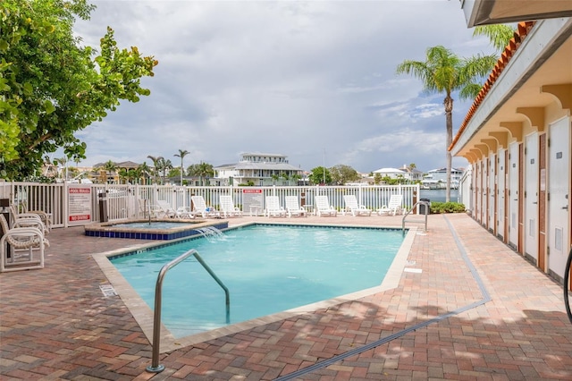 530 S Gulfview Blvd Unit 205, Clearwater, FL 33767 - community pool featuring a community hot tub and a patio