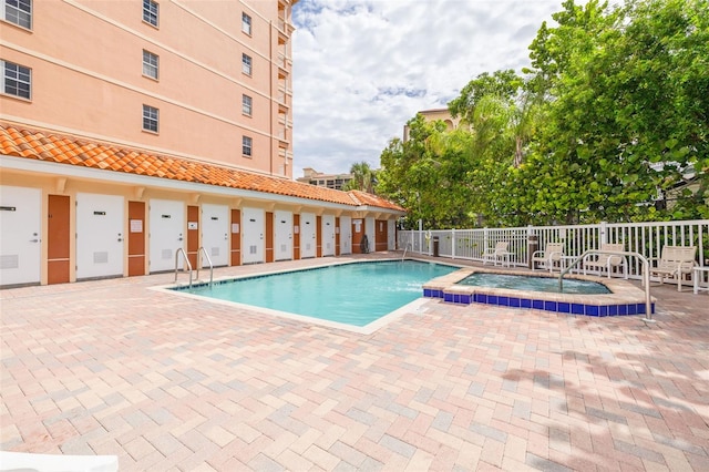 530 S Gulfview Blvd Unit 205, Clearwater, FL 33767 - community pool with a hot tub and a patio