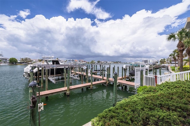 530 S Gulfview Blvd Unit 205, Clearwater, FL 33767 - dock area with boat lift and a water view