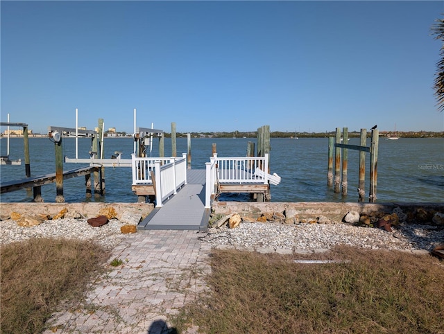 dock area with a water view