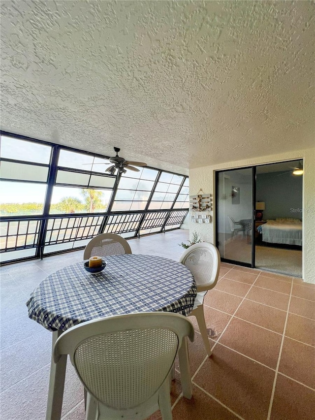 interior space with ceiling fan and a healthy amount of sunlight