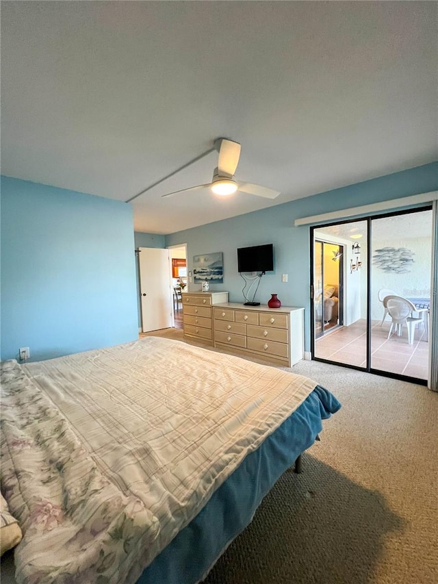 bedroom featuring ceiling fan and light carpet