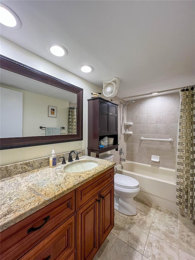 full bathroom featuring toilet, vanity, and shower / bath combination with curtain