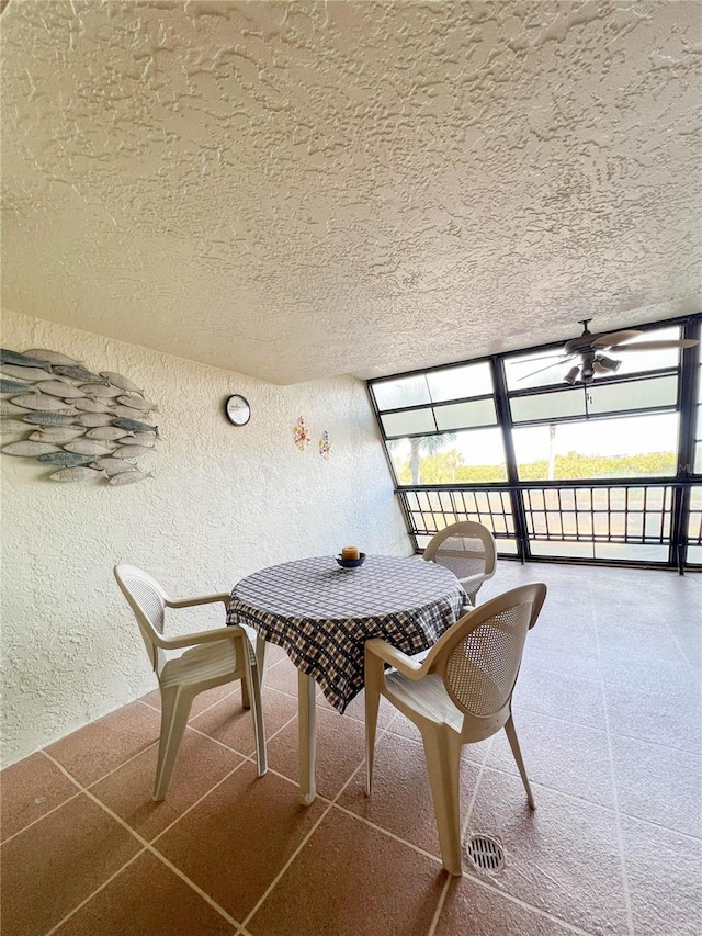 dining room featuring ceiling fan