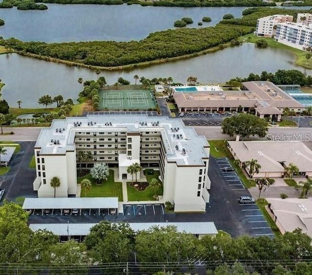 bird's eye view with a water view