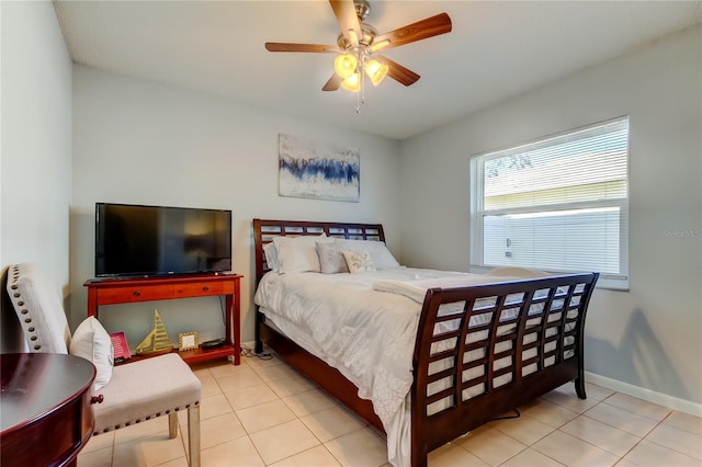 tiled bedroom with ceiling fan